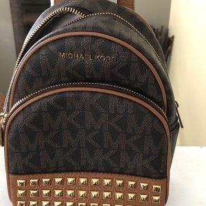 Michael Kors small backpack.